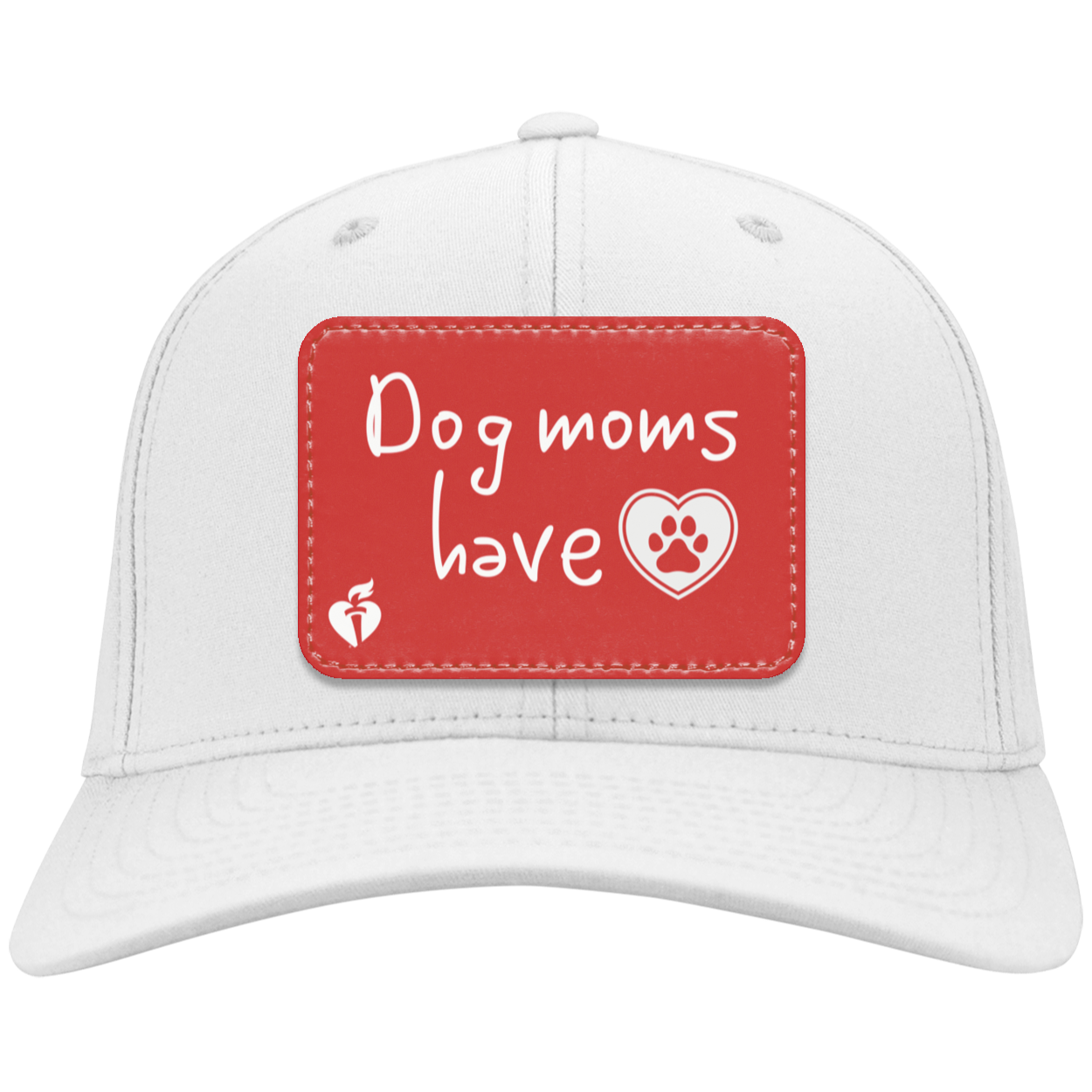 white cap with red vegan leather patch that says "Dog moms have heart" . A heart with a paw print inside and heart and torch logo.