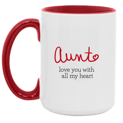 White mug with inside red finish and red handle. Side 1 "aunt" in handwriting like font with "love you with all my heart" text below. Side 2 Red dress symbol inside a heart shape.