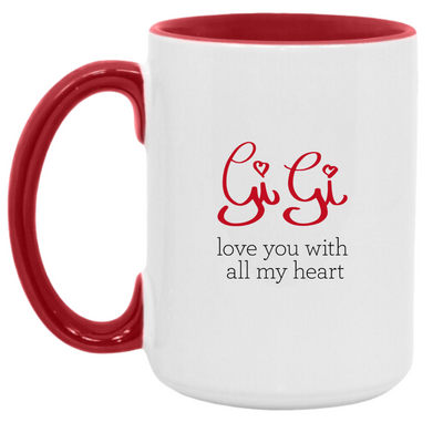 White mug with inside red finish and red handle. Side 1 "Gi Gi" in handwriting like font with "love you with all my heart" text below. Side 2 Red dress symbol inside a heart shape.