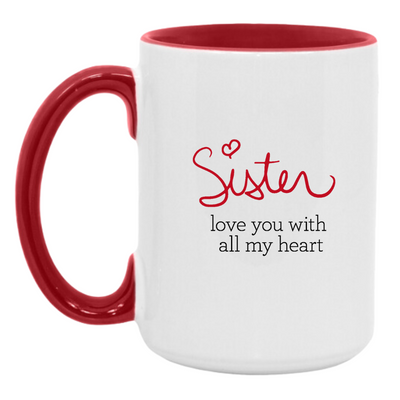 White mug with inside red finish and red handle. Side 1 "Sister" in handwriting like font with "love you with all my heart" text below. Side 2 Red dress symbol inside a heart shape.