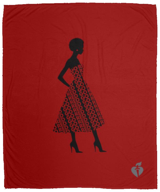 red plush fleece with AHA heart and torch in bottom right corner and large design of silhouette of woman in dress made up of the words "GO RED" in repeat.