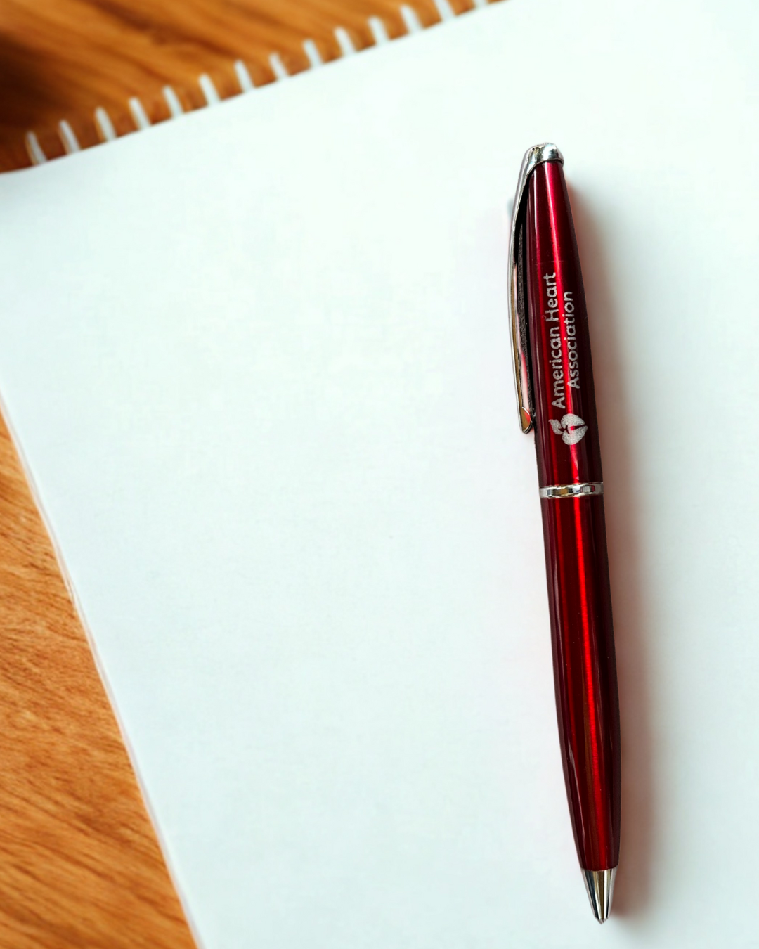Pen featured on a notebook.
