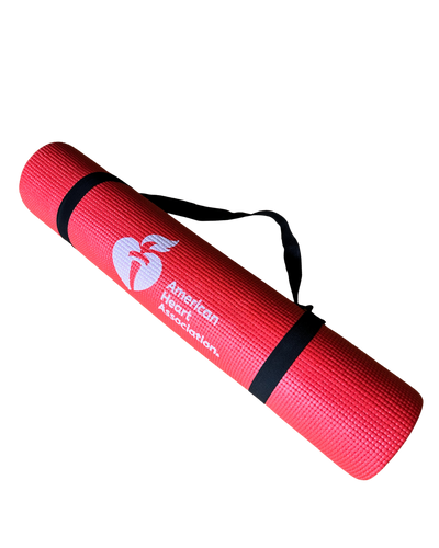 Picture of red rolled up yoga mat with black easy carry strap. 